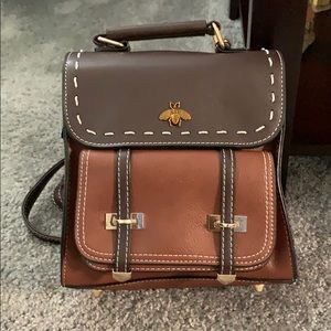 Small brown vegan leather backpack